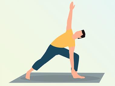 man stretching on a yoga mat