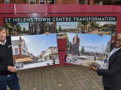 Councillor Richard McCauley and Ojay McDonald from ATCM with images of the town centre redevelopments for St Helens and Earlestown