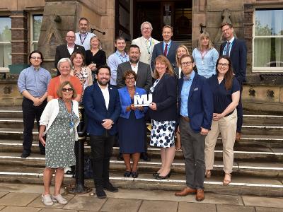 Members from St Helens  Inequalities Commission with The MJ Award