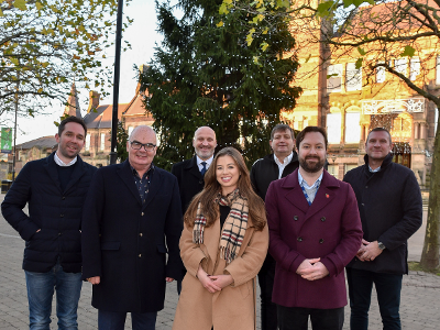 Sponsors of St Helens Christmas lights with cabinet members Cllr Andy Bowden and Cllr Richard McCauley in front of Victoria Square Christmas tree