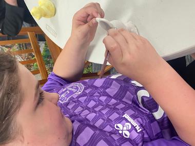 Children and young people enjoying Pottery Painting sessions