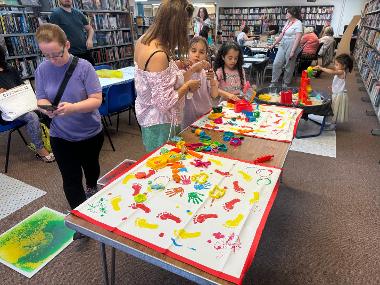 Children, young people and their families enjoying SEND Summertime Play Sessions